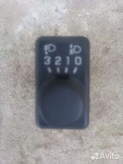 Ниссан альмера N15 кнопка корректора фар