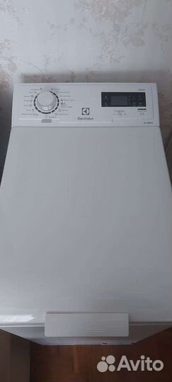 Стиральная машина Electrolux вертикальная