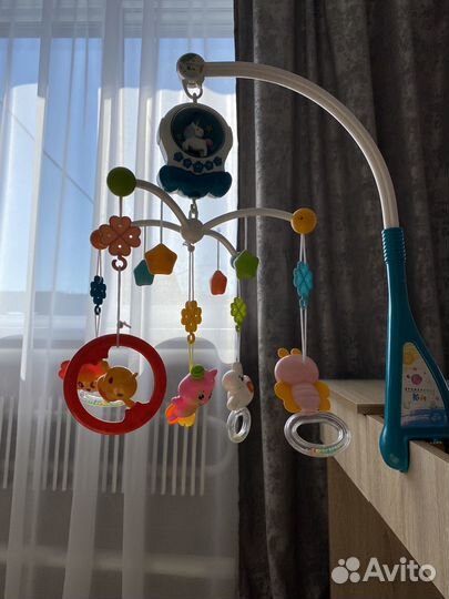 Музыкальный мобиль в кроватку