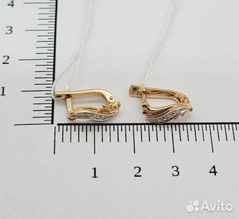 Золотые серьги с камнем