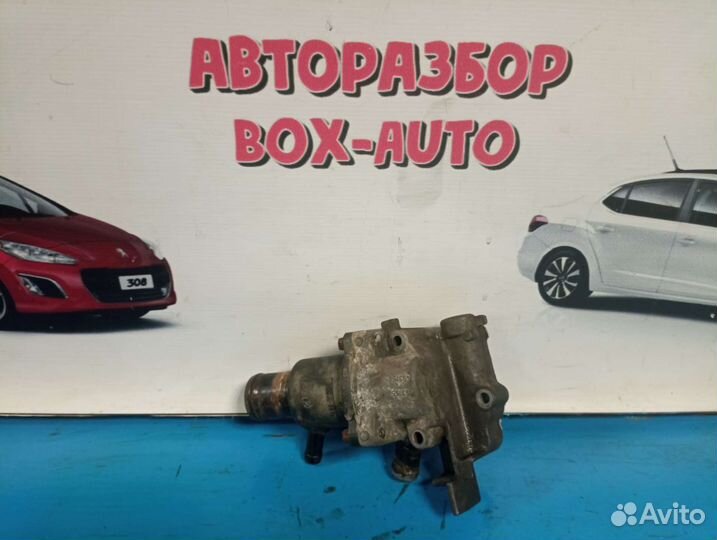 Корпус термостата Renault Logan 1