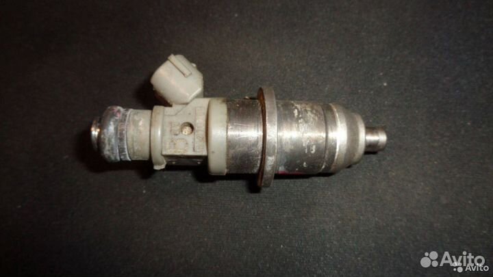 Форсунка топливная Mitsubishi Pajero 3 6G74 GDi