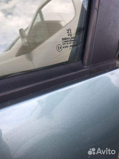 Дверь передняя левая Peugeot 206