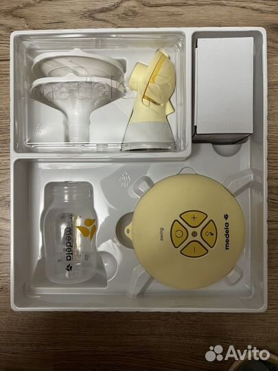 Молокоотсос medela swing flex электрический