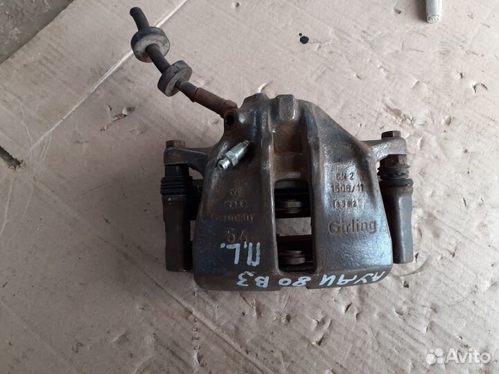 Суппорт передний левый Ауди 80,90