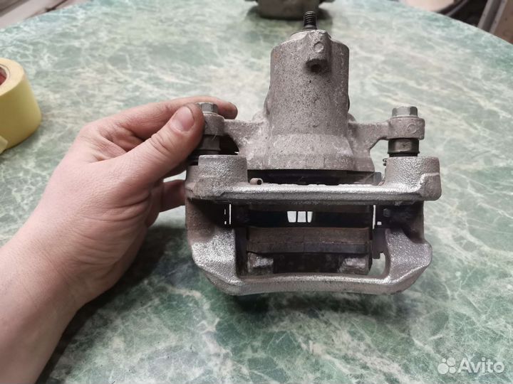 Суппорт задний левый Kia K3