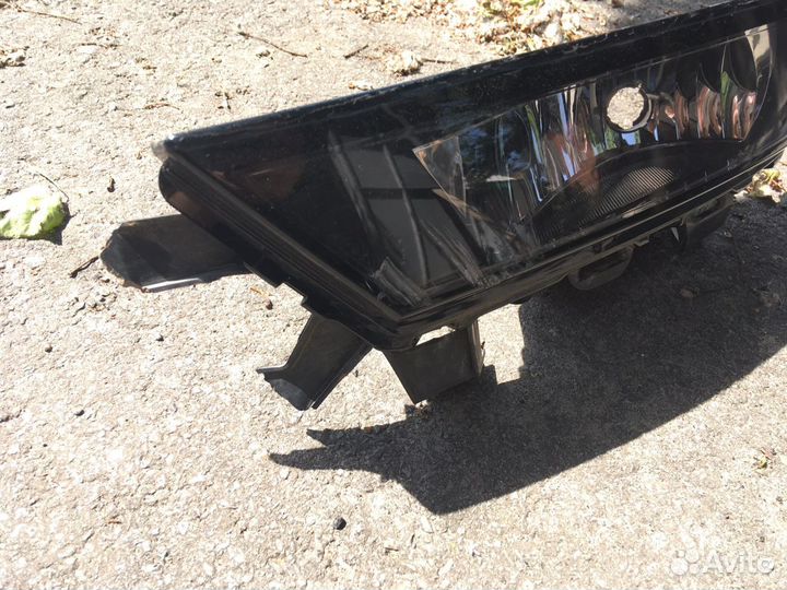 Фара противотуманная Шкода Рапид левая