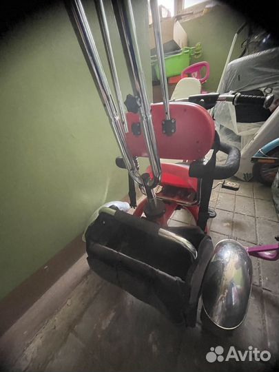 Трехколесный велосипед с ручкой