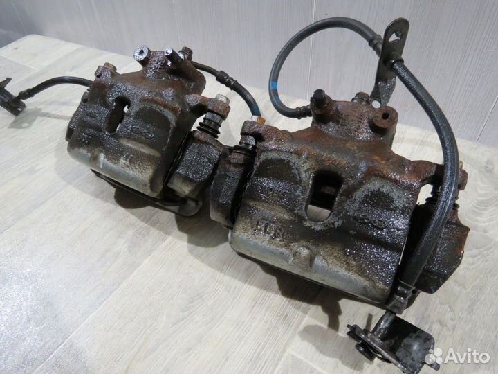 Суппорт передний Kia Optima 4