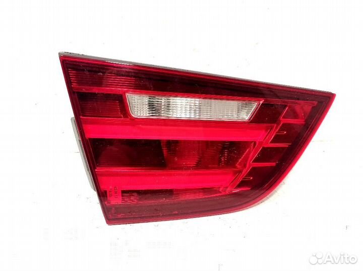 Фонарь крышки багажника левый BMW