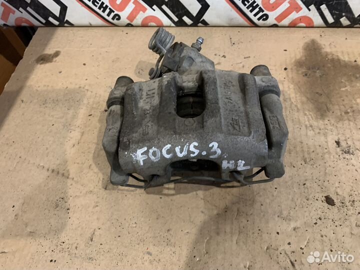 Суппорт задний левый правый Ford Focus 3