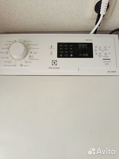 Стиральная машина с вертикальной загрузкой