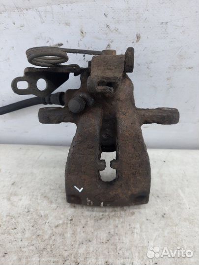 Суппорт тормозной задний левый Ford Galaxy минивэн