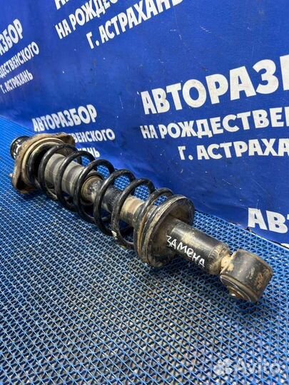 Задняя стойка амортизатора Mitsubishi Lancer 9