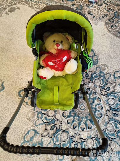 Игрушечная коляска для кукол