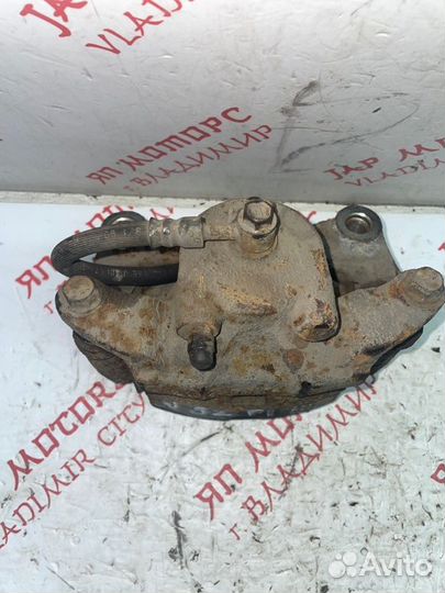 Суппорт тормозной передний правый Nissan Teana