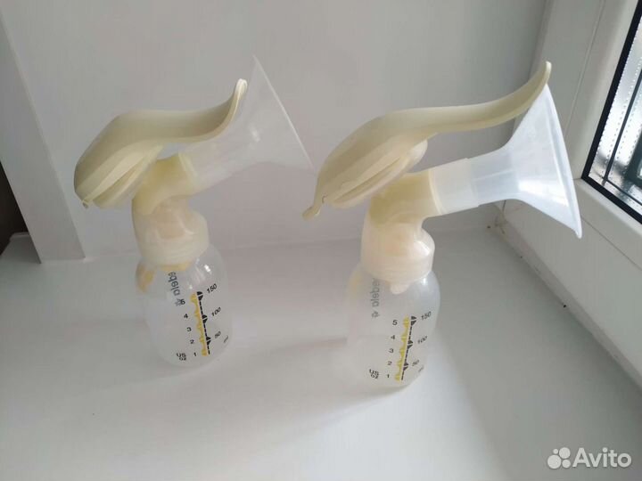 Молокоотсос medela ручной