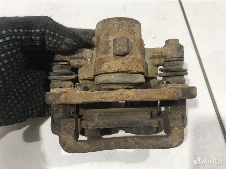 Суппорт задний правый Toyota Corolla E12