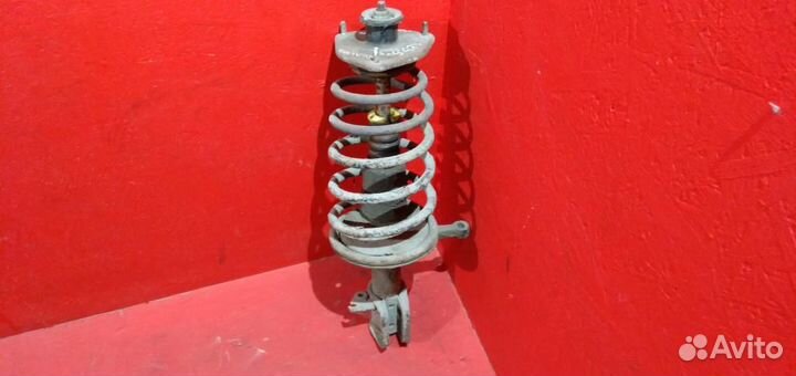 Калина стойка передняя левая пружина конус с деф