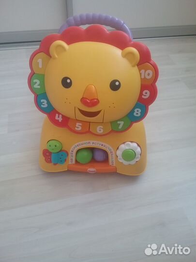 Машинка-ходунки-толокар лев Fisher Price