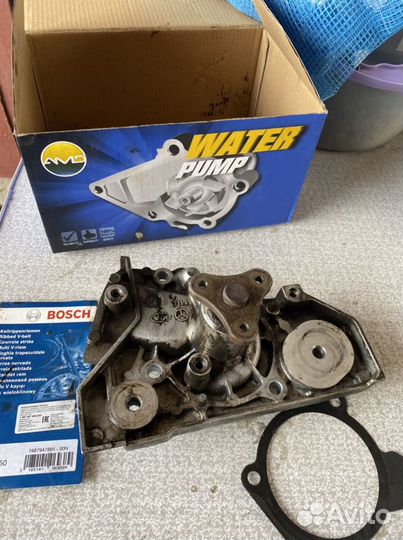 Водяной насос Kia Spectra