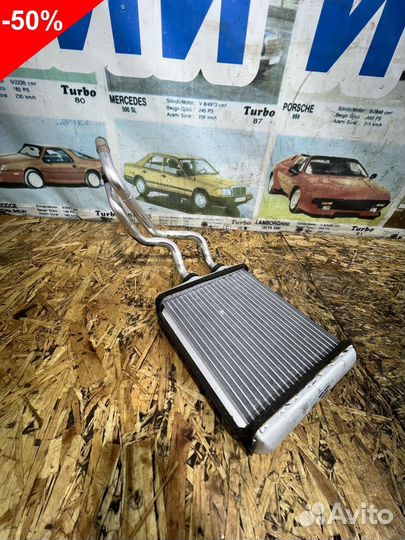 Радиатор печки Опель Астра H