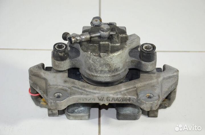 Суппорт тормозной передний левый Land Rover