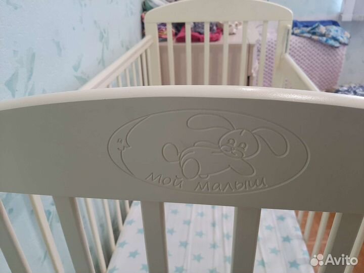 Детская кроватка с поперечным маятником