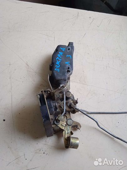 Замок двери задний левый Opel Vectra A Опель