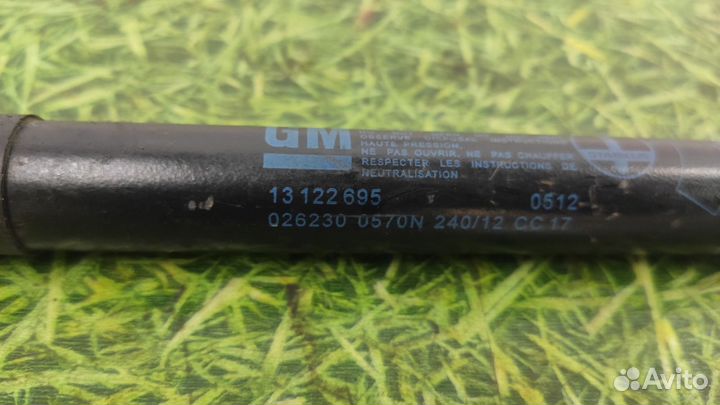 Амортизатор двери багажника Opel Astra H 2004-2015