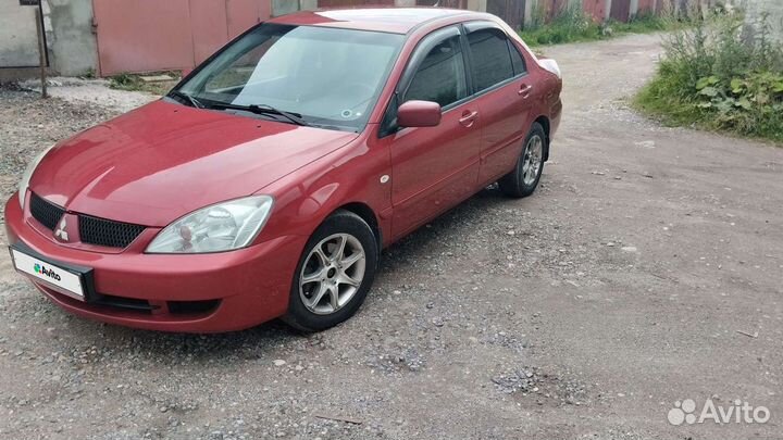 Mitsubishi Lancer 1.6 МТ, 2006, 185 000 км