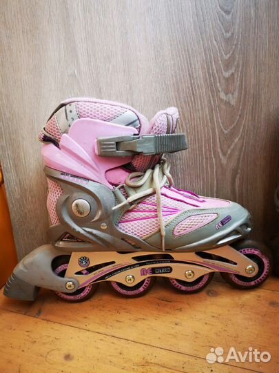 Роликовые коньки