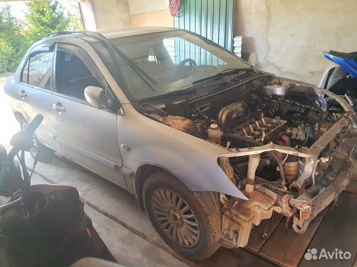 Разбирается Мицубиси Лансер 9. МКПП 1.6