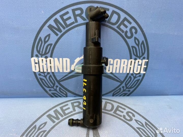 Форсунка омывателя фары левая Mercedes-Benz