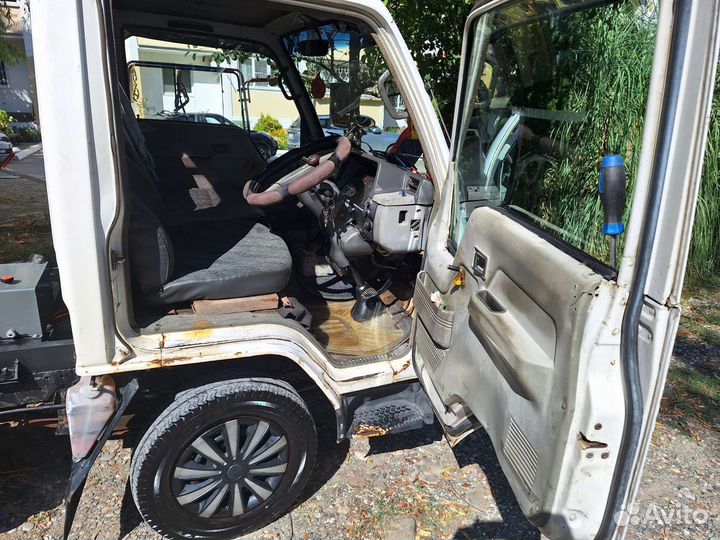 Mitsubishi Fuso Canter бортовой, 1990