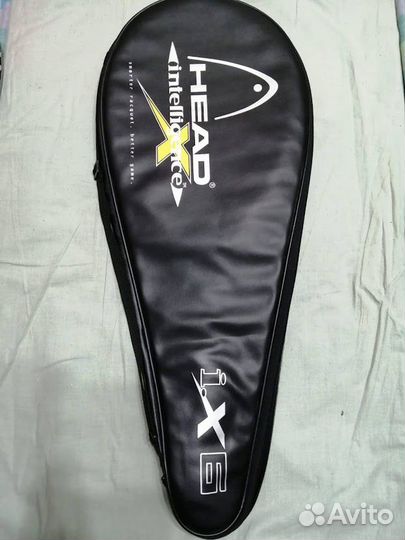 Теннисная ракетка