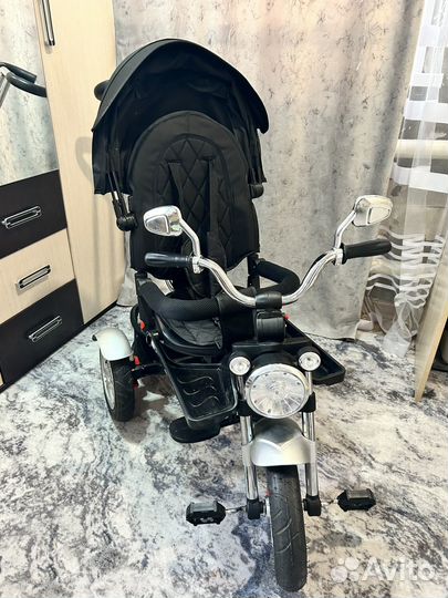 Трехколесный велосипед-коляска luxmom