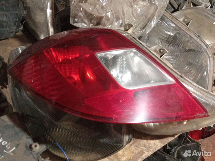 Фонарь задний opel corsa д