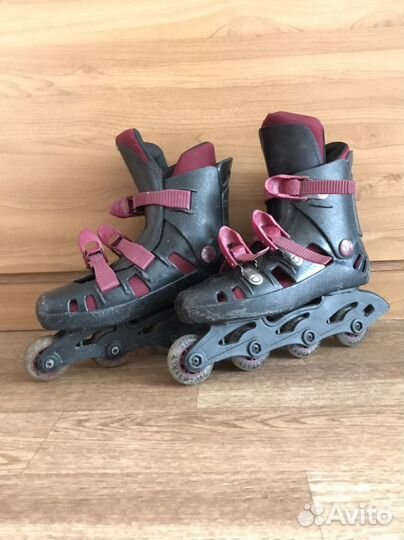 Роликовые коньки