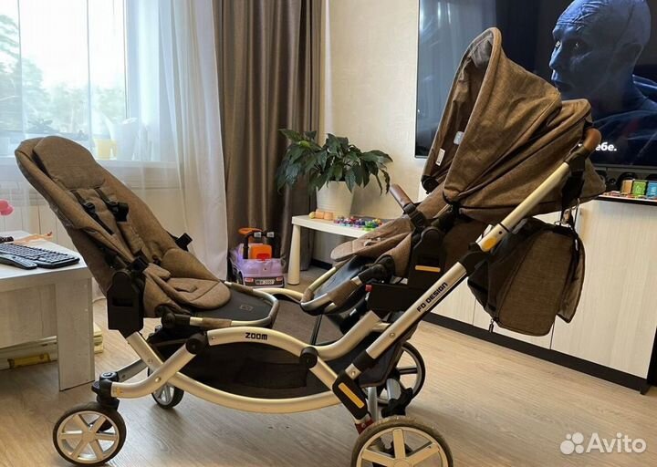 Двухместная коляска