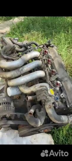 Двигатель Nissan Largo W30 ka24de 066908U 130U164