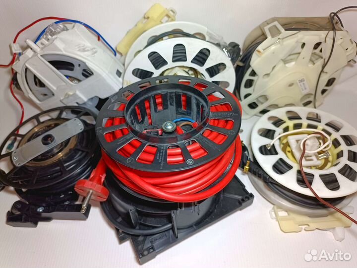 Механизм сматывания шнура пылесоса