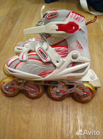 Роликовые коньки