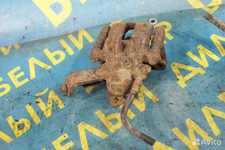 Задний суппорт + скоба Nissan Primera P10