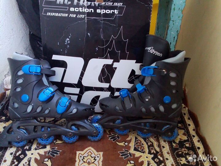 Роликовые коньки