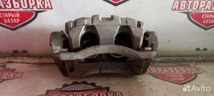 Суппорт тормозной передний правый Honda Cr-V RM4