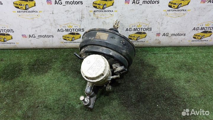 Вакуумник тормозной Mitsubishi Carisma I