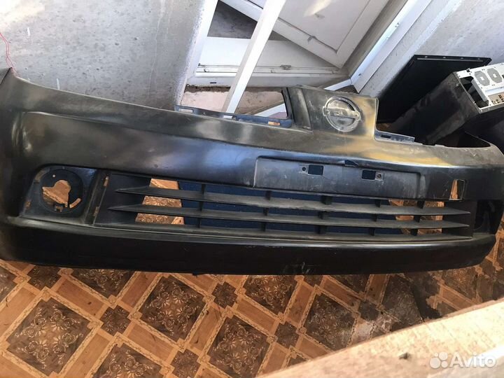 Бампер Nissan tiida