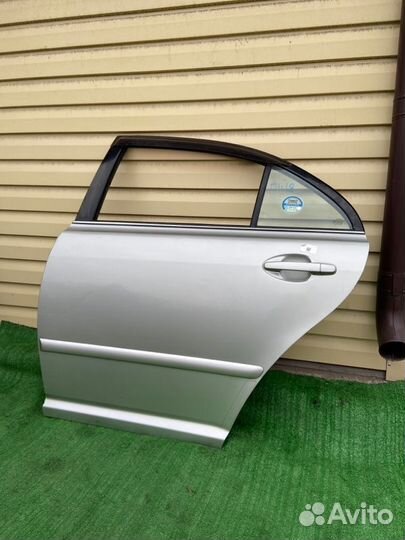 Дверь задняя левая Toyota Avensis ADT250