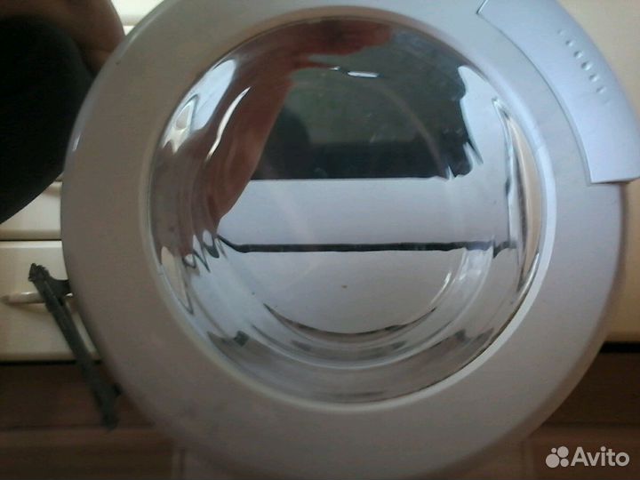 Дверца стиральной машинки